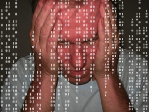 white man with superimposed computer code