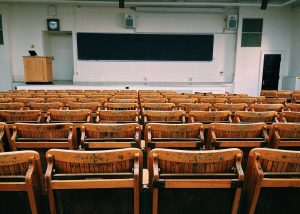 photo of an empty lecture hall from the back